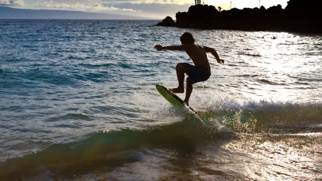 Skimboarder not wrapping a wave